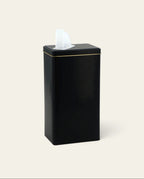 Boldo stainless steel yerba mate canister in matte black with a convenient white plastic pouring spout.