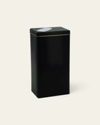 Boldo stainless steel yerba mate container in black with a square design and a convenient pouring spout.