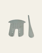 Boldo stainless steel yerba mate separator and flat tool for maintaining water and herb balance in a mate gourd.